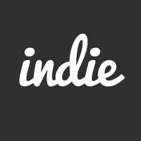 The word "indie" is written in white cursive letters on a dark gray background.